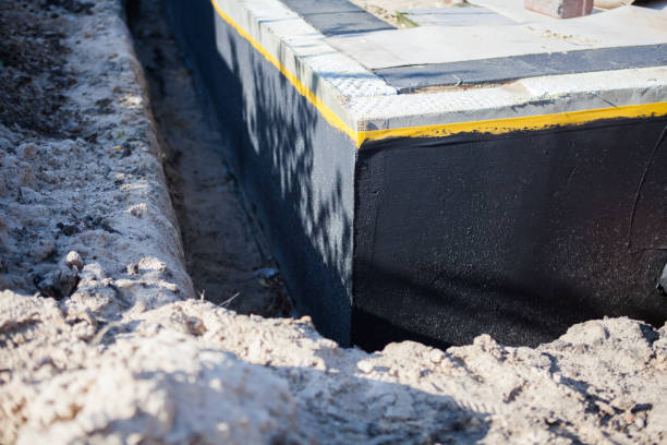 Professional Waterproofing technician working in Melrose, OH
